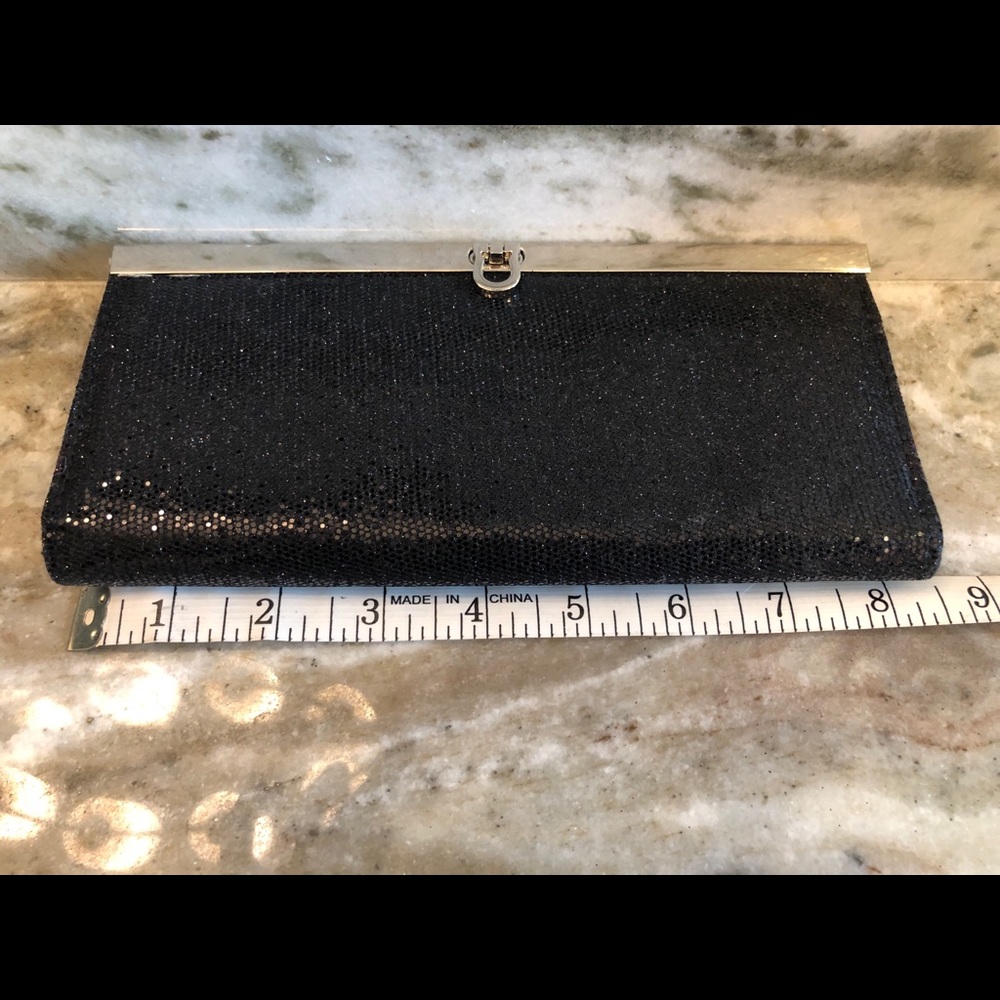 Small black Mundi shimmery clutch
